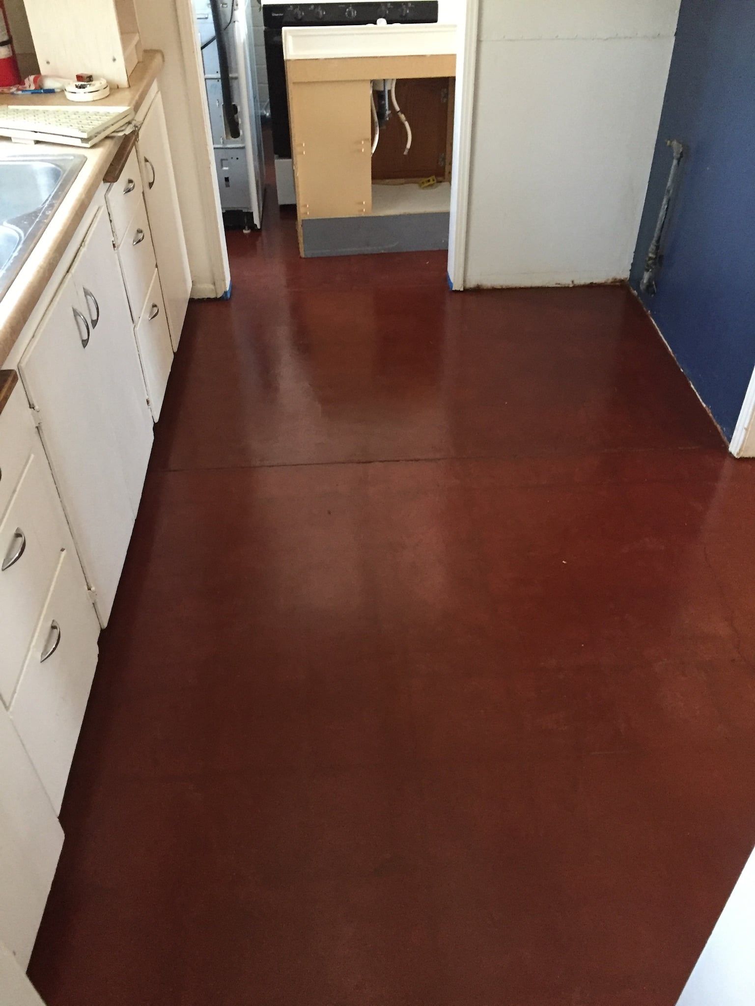 new residential polished concrete stained in red